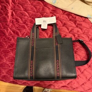 Coach Leather smith Tote Bag with Burgundy interior and Silver Hardware.